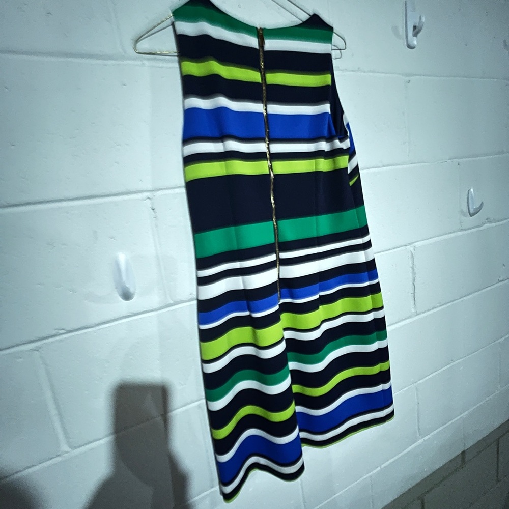 Striped ddress has a beaded color and is very attactive.